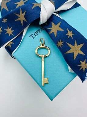 Retired Tiffany & Co. 18K Yellow Gold Oval Key Charm with Packaging